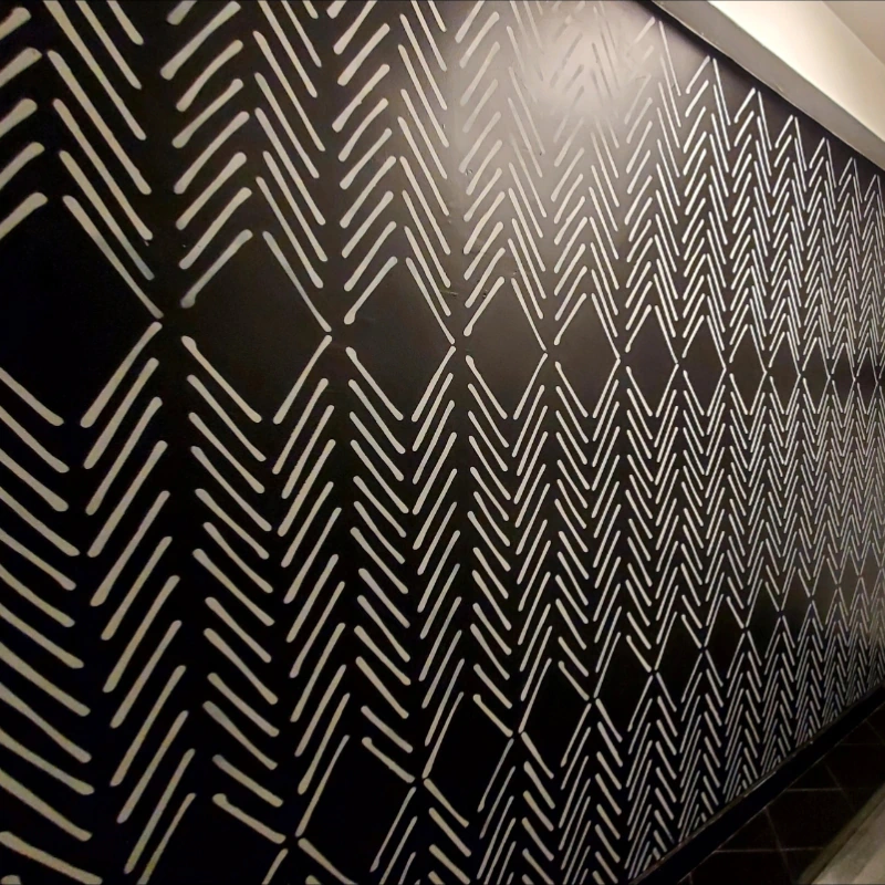 black pattern design on a wall